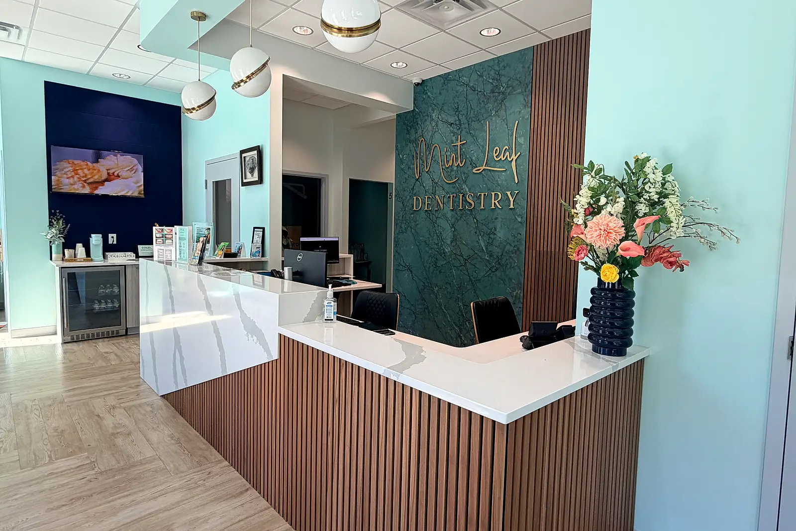 The front desk and coffee bar at Mint Leaf Dentistry